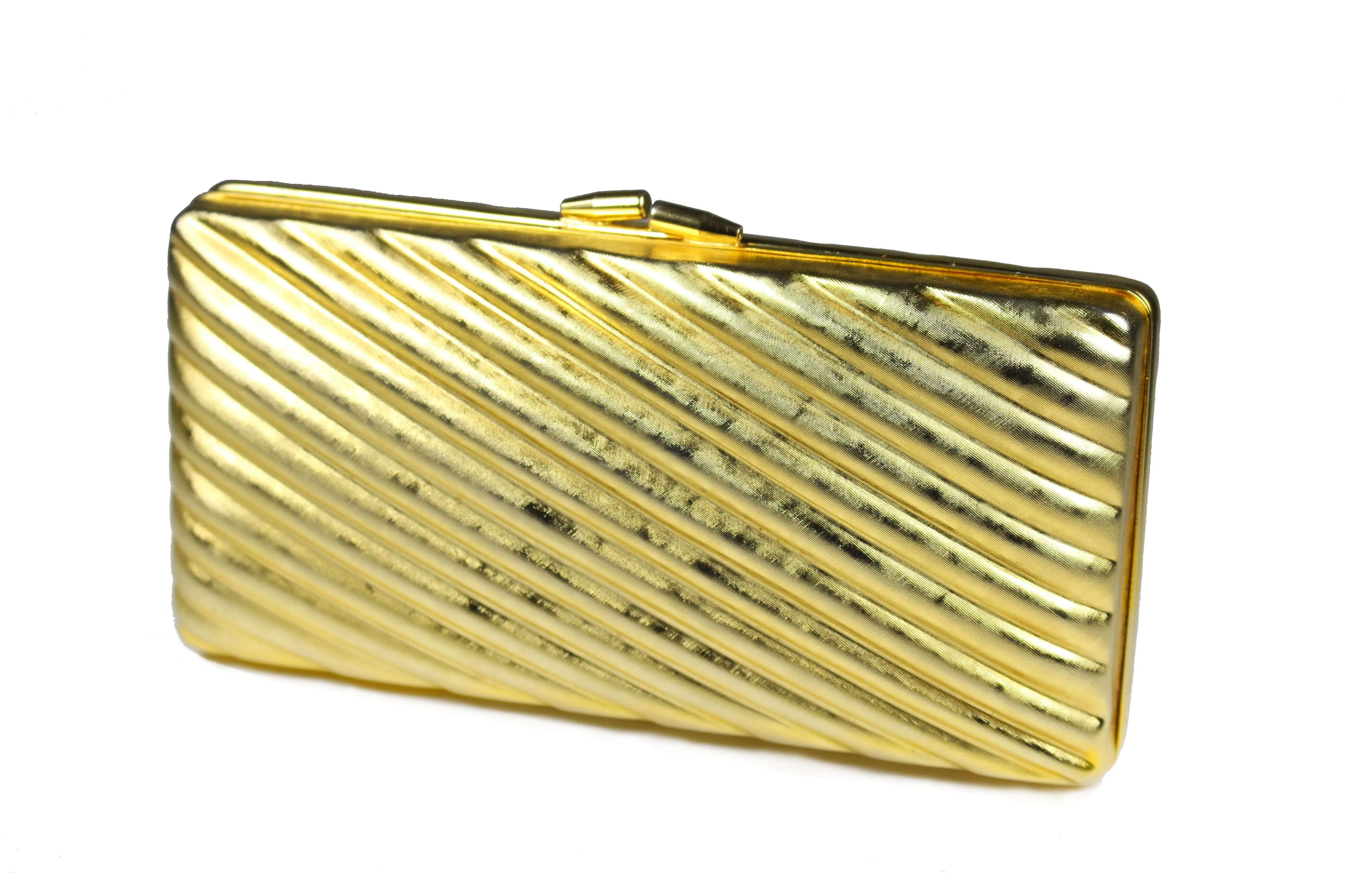 Gold metal clutch with diagonal engraving