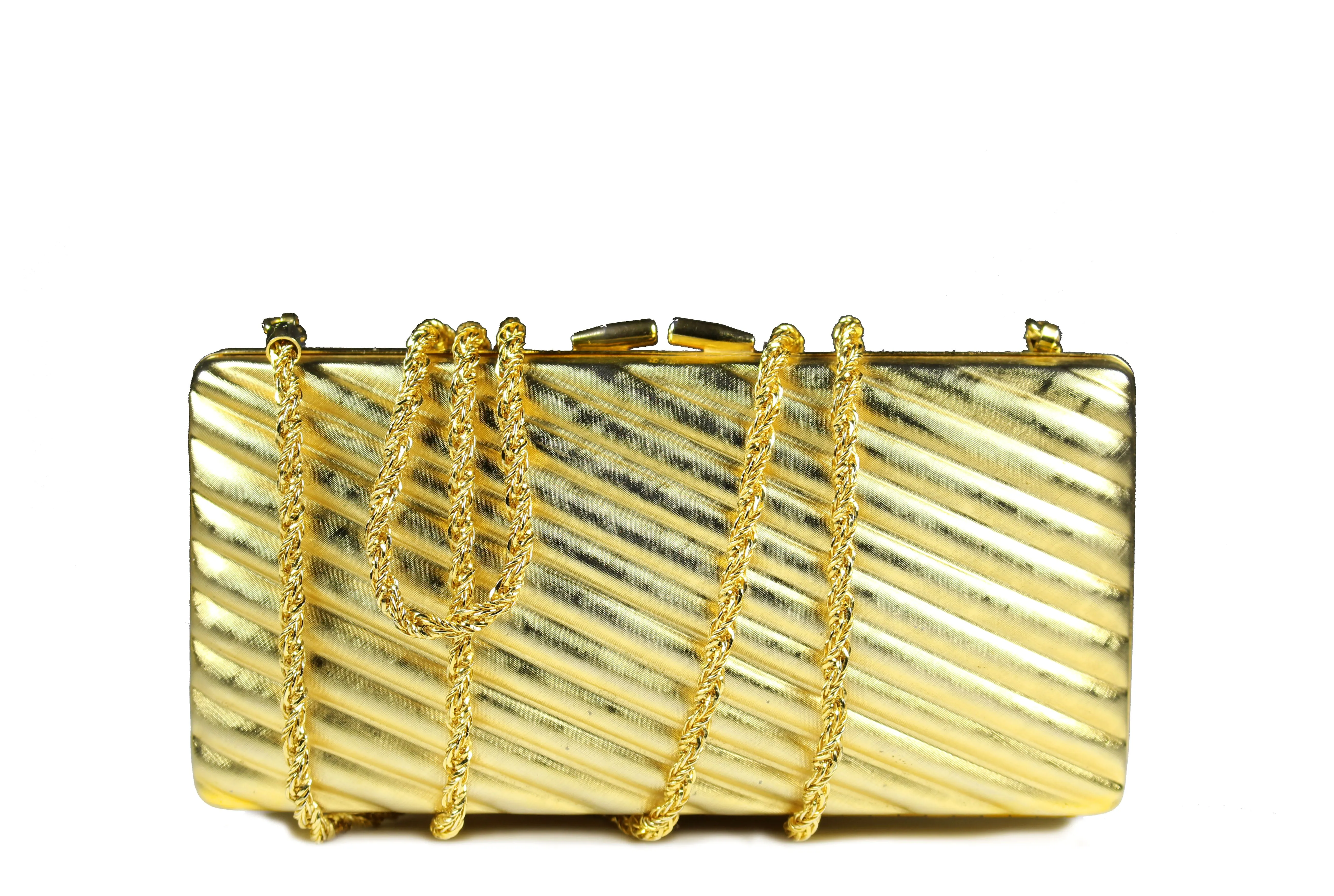 Gold metal clutch with diagonal engraving