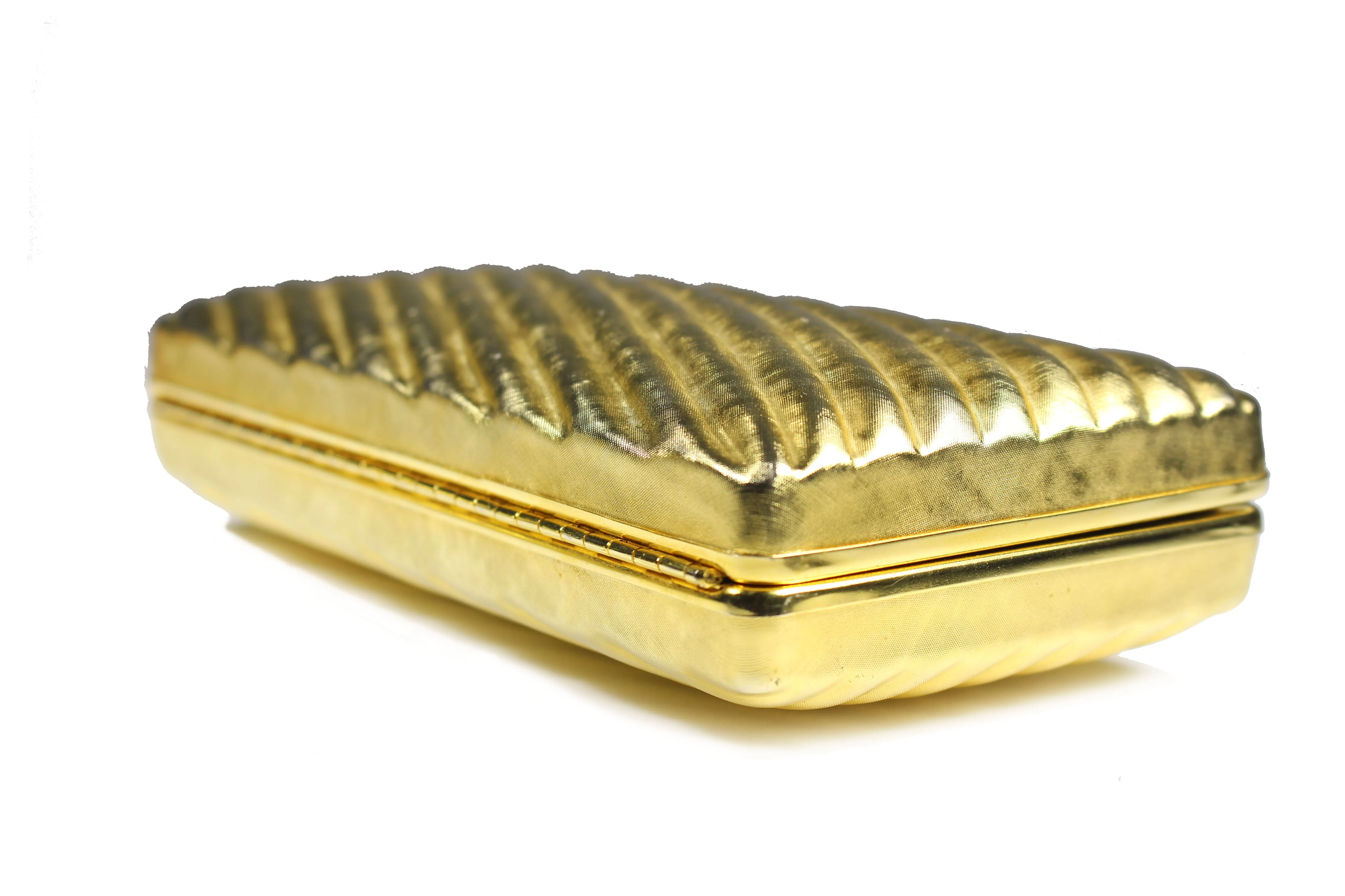 Gold metal clutch with diagonal engraving